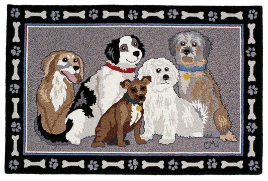 Rug with five dogs and a border of bones and paw prints