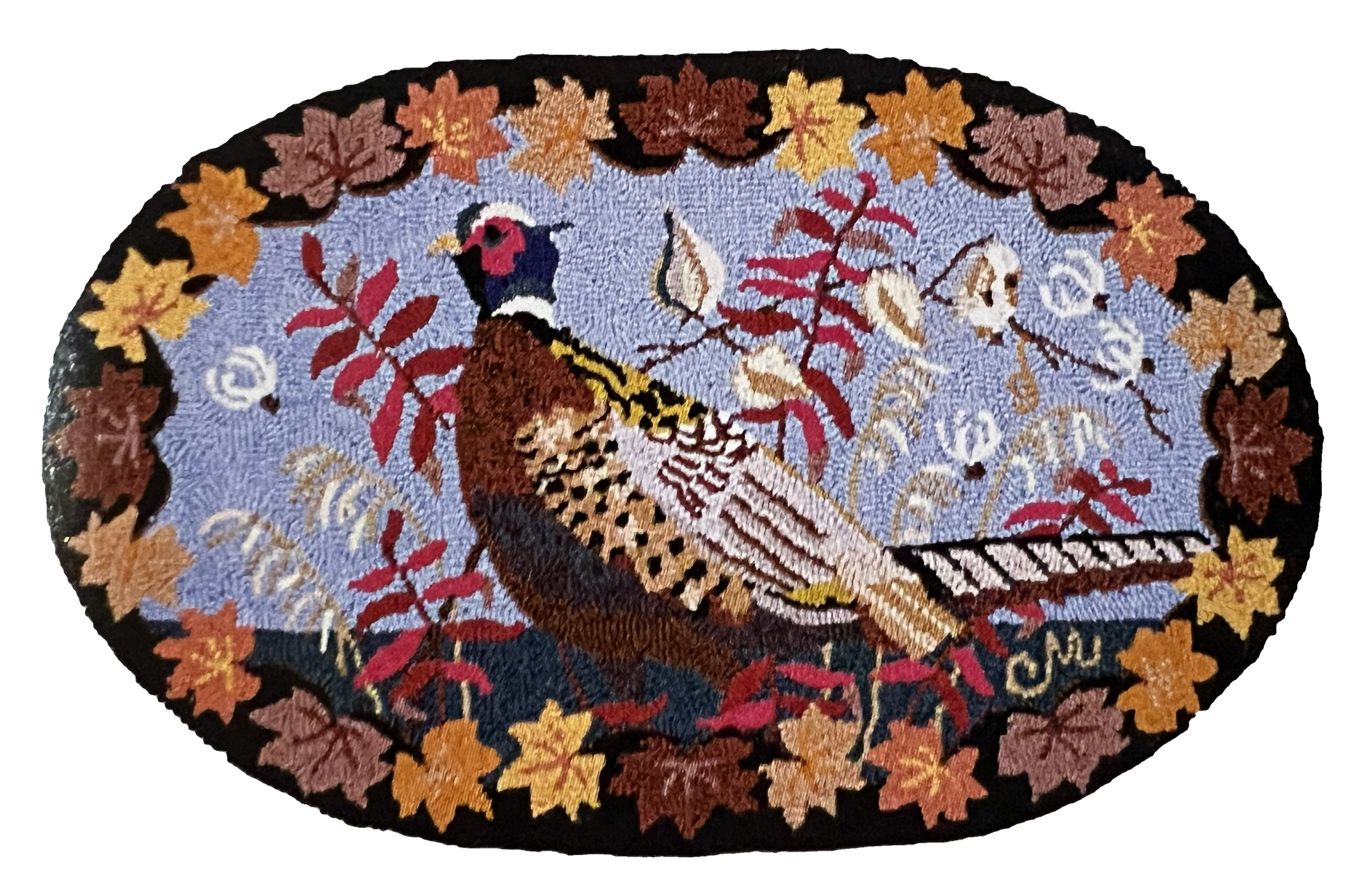 An oval hand-hooked rug featuring a pheasant bird in the center, surrounded by autumn leaves and branches on a light blue background, with a black border.