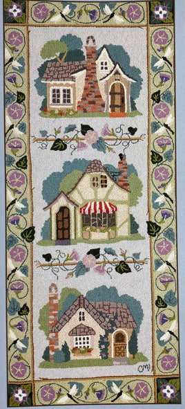 Classic Claire Murray hand-hooked runner featuring three whimsical cottage houses with floral and bird motifs around the border.