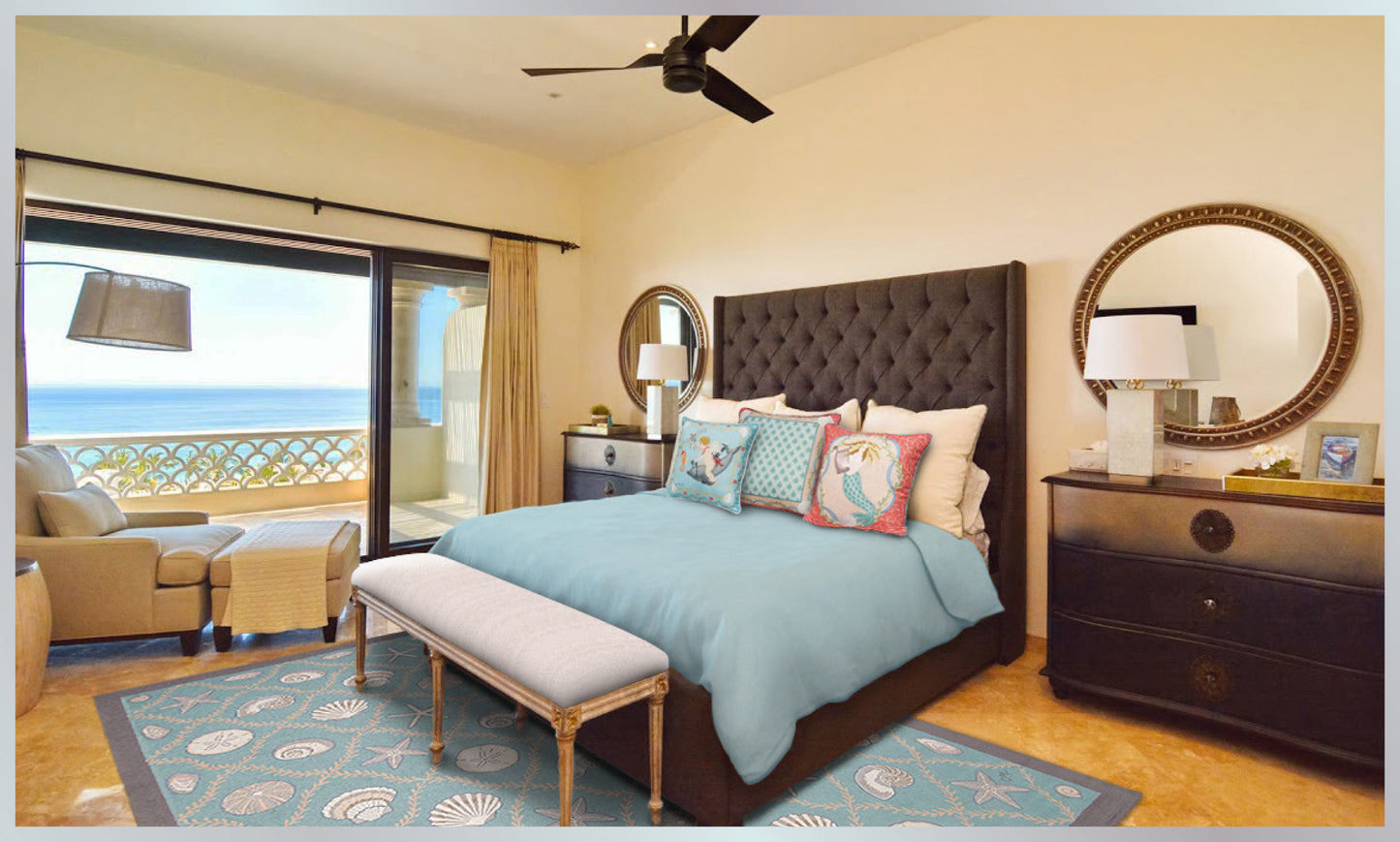 Seashell rug on floor, sirens of the sea pillows and quilt.